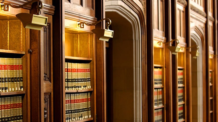 Warmly lit law library interior